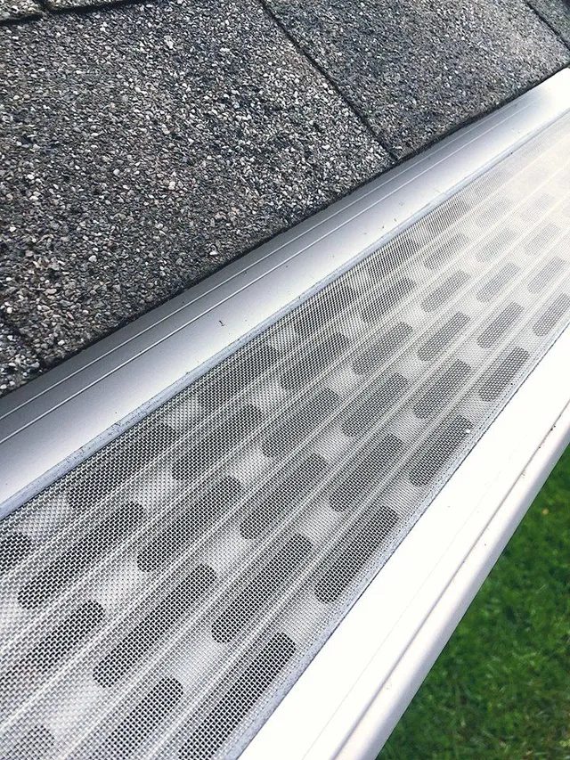 Stainless micro-mesh gutter guard installed by a St. Louis gutter company